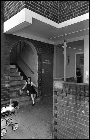 kids playing at the bottom of the stairs